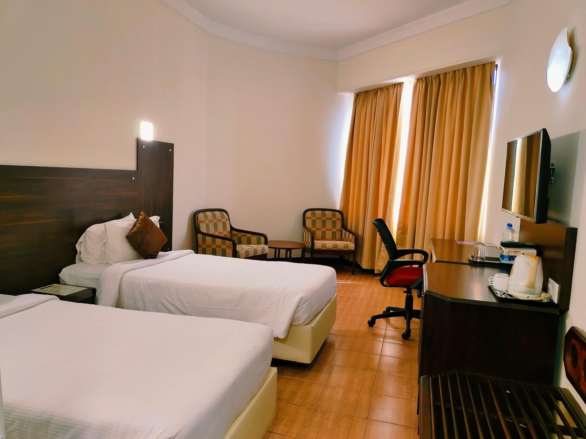 Presidency Kochi City Centre Extérieur photo